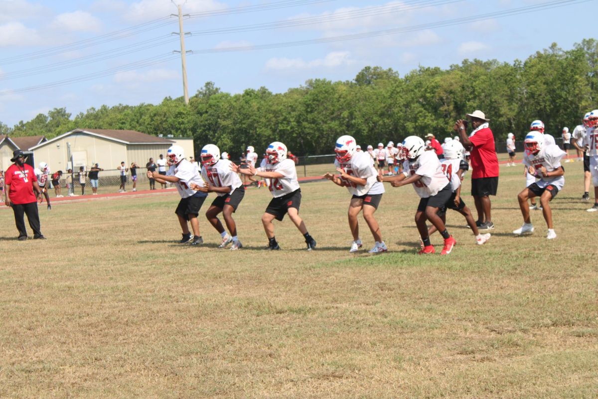 8th Grade Football practices at the beginning of the year for their upcoming season.